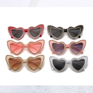 Set of six heart-shaped rhinestone sunglasses in multiple colors with crystal accents