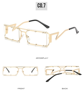 Detail of square sunglasses with rivet studs and unique lightning bolt temple design
