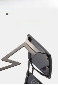 Detail of lightning-shaped metal temples and silicone nose pads on square sunglasses