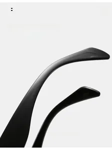Detail of curved black sunglasses legs showing ergonomic arc for comfortable wear