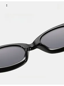 Close-up of integrated nose pads on black oval sunglasses for pressure-free comfort