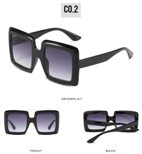 Three perspectives of oversized black square sunglasses with purple gradient lenses C0.2
