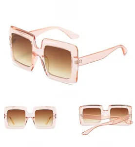 Three-view display of vintage oversized square sunglasses in transparent pink with CE mark