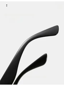 Close-up of curved sunglasses legs in matte black for comfortable ergonomic wear