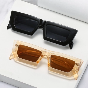 Retro rectangular sunglasses in solid black and transparent champagne thick frames