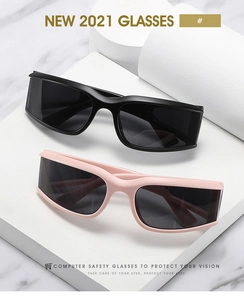Detail of black and pink rectangular cycling sunglasses on white marble display stand