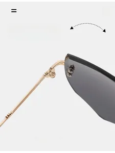 Macro shot of durable golden metal hinge and screws on rimless cat eye sunglasses