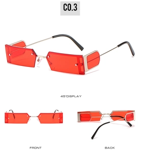 Detail view of small square sunglasses with red lenses and minimalist metal half-frame