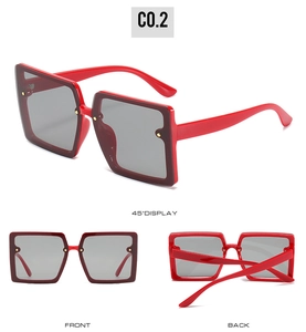 Three-angle product showcase of red oversized square sunglasses with dark lenses