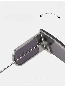 Detail showing the durable metal texture hinge of silver square sunglasses with gray lenses