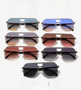 Detailed display of pilot style oversized sunglasses with colorful gradient lenses and double bridge