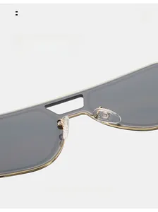 Detailed close-up of comfortable silicone nose pads on gold metal frame sunglasses