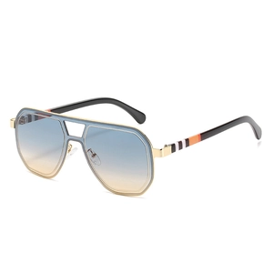Retro geometric oversized sunglasses with gold metal frame and blue gradient lenses