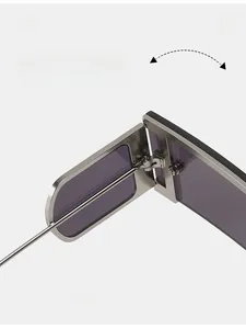 Macro view of durable metal hinges on vintage square sunglasses with purple lenses