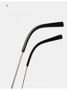 Detail of square punk sunglasses featuring sleek metal legs and comfortable curved ear hooks