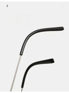 Close-up of curved metal glasses temples with black tips for comfortable wear