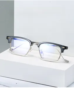 Macro detail of retro square semi-rimless frames with anti-blue light metal coating