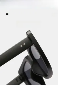 Détail de la charnière de lunettes de soleil carrées avec rivets et monture mate