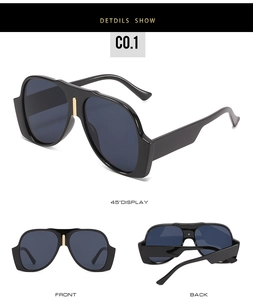 Detailed views of oversized sunglasses with dark blue lenses and gold metal nose bridge