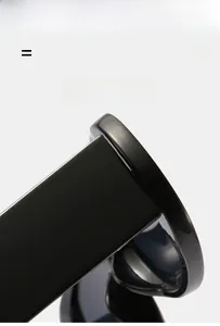 Détail de lunettes de soleil rondes montrant les charnières et le fini noir poli