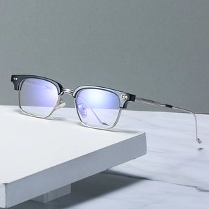 Classic half-rim square glasses with black acetate and silver metal frame for a retro look