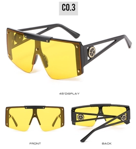 Detailed views of oversized sunglasses with yellow lenses and golden rivet accents