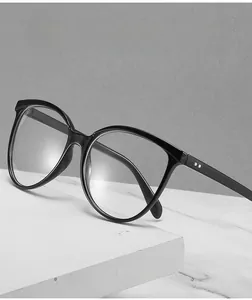 Detail showing high-quality black cat-eye anti blue light frames on marble surface