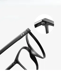 Detail showing the metal hinge and mortise temples on black cat-eye glasses frames