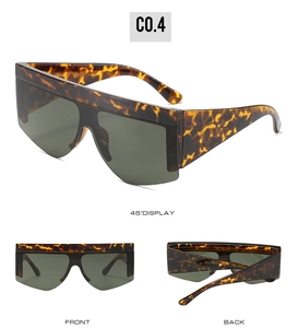 Three-angle display of flat top oversized sunglasses with tortoise frame and green lenses