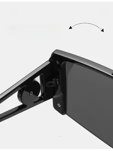 Macro shot of durable metal hinge and geometric hollow temple on oversized sunglasses