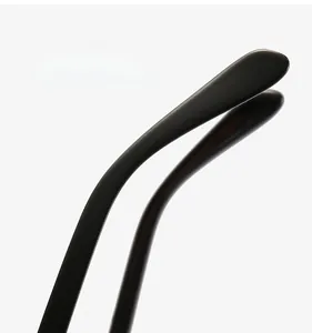 Detail of matte black metal temples on anti-blue light glasses with ergonomic curved tips