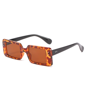 Retro rectangle tortoise shell sunglasses with dark brown lenses and metal rivet details