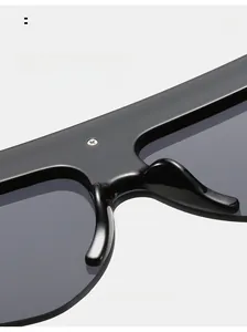 Detailed macro view of comfortable nose pads on black oversized fashion sunglasses