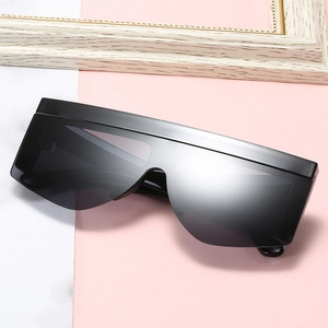 Modern oversized shield sunglasses with black flat top frame and dark lenses