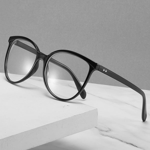 Cat eye blue light blocking glasses with black frames and elegant metal stud accents