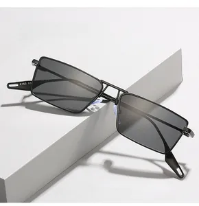 Close-up of black rectangular metal sunglasses frame showing the model number 9153 63 detail