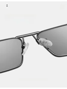 Detail of comfortable ergonomic nose pads on black metal frame sunglasses for no-mark wear
