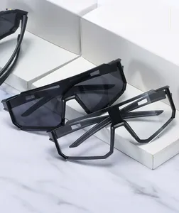 Detailed view of oversized cycling sunglasses with black and transparent lens options