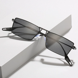 Unisex matte black rectangle frame sunglasses with dark grey lenses and hollow temple detail