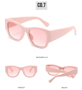 Detail view of pink square sunglasses featuring stylish quilted texture on wide temples