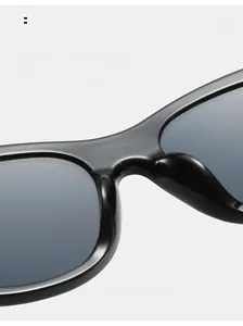Close-up of comfortable nose pads on black square frame sunglasses with gradient lenses