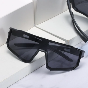 Men's oversized cycling sunglasses with geometric black frames and dark smoke lens