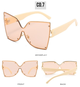 Vue multi-angle détaillée de lunettes de soleil orange jelly oversize avec branches larges