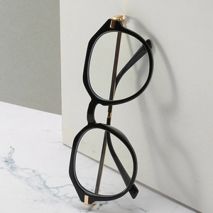 Chic black oversized square frames with golden metal legs for blue light protection
