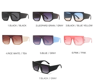 Matrix showing oversized flat top sunglasses in seven colors with metal rivet details