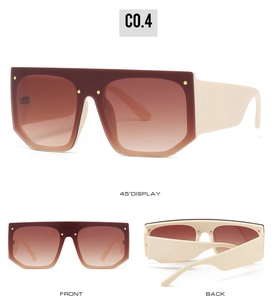 Three-view display of oversized cream sunglasses with brown gradient lenses and gold studs