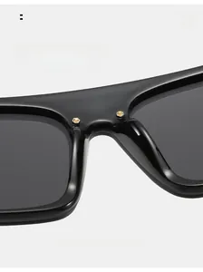 Detail of ergonomic integrated nose pads on oversized flat top sunglasses for comfort