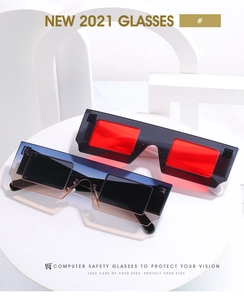 Close-up of futuristic pixel-style square sunglasses with vibrant tinted lenses