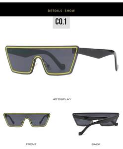 Détails des lunettes de soleil rectangulaires avec monture noire et bords jaune fluo