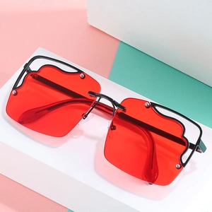 Fashionable wave edge sunglasses with red transparent lenses and slim black metal frame